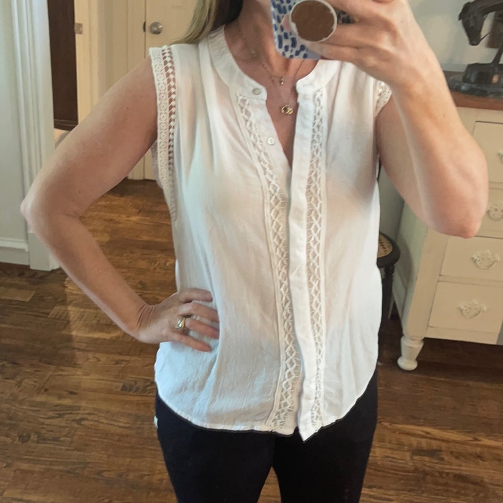 White sleeveless blouse